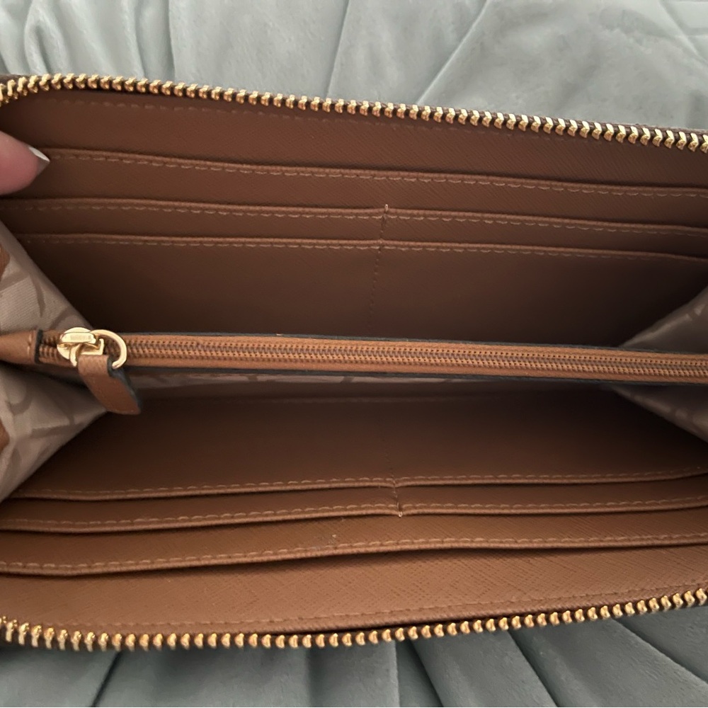 Brown/Khaki faux leather. Looks like it did when I bought it. Used twice.